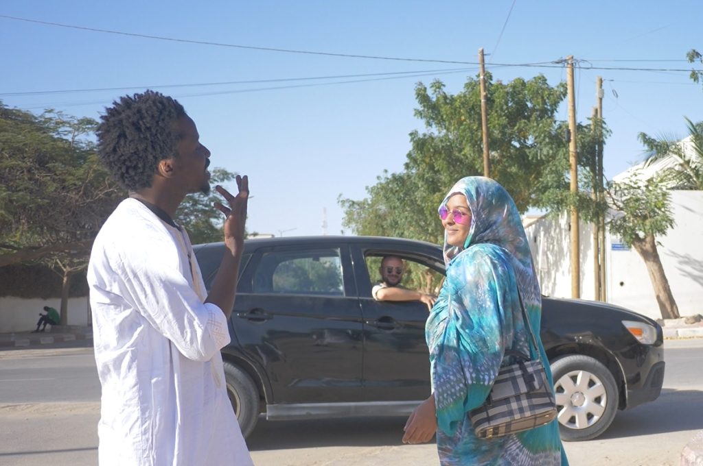 Just an observer? Scene from the music video with Leila Moulay.